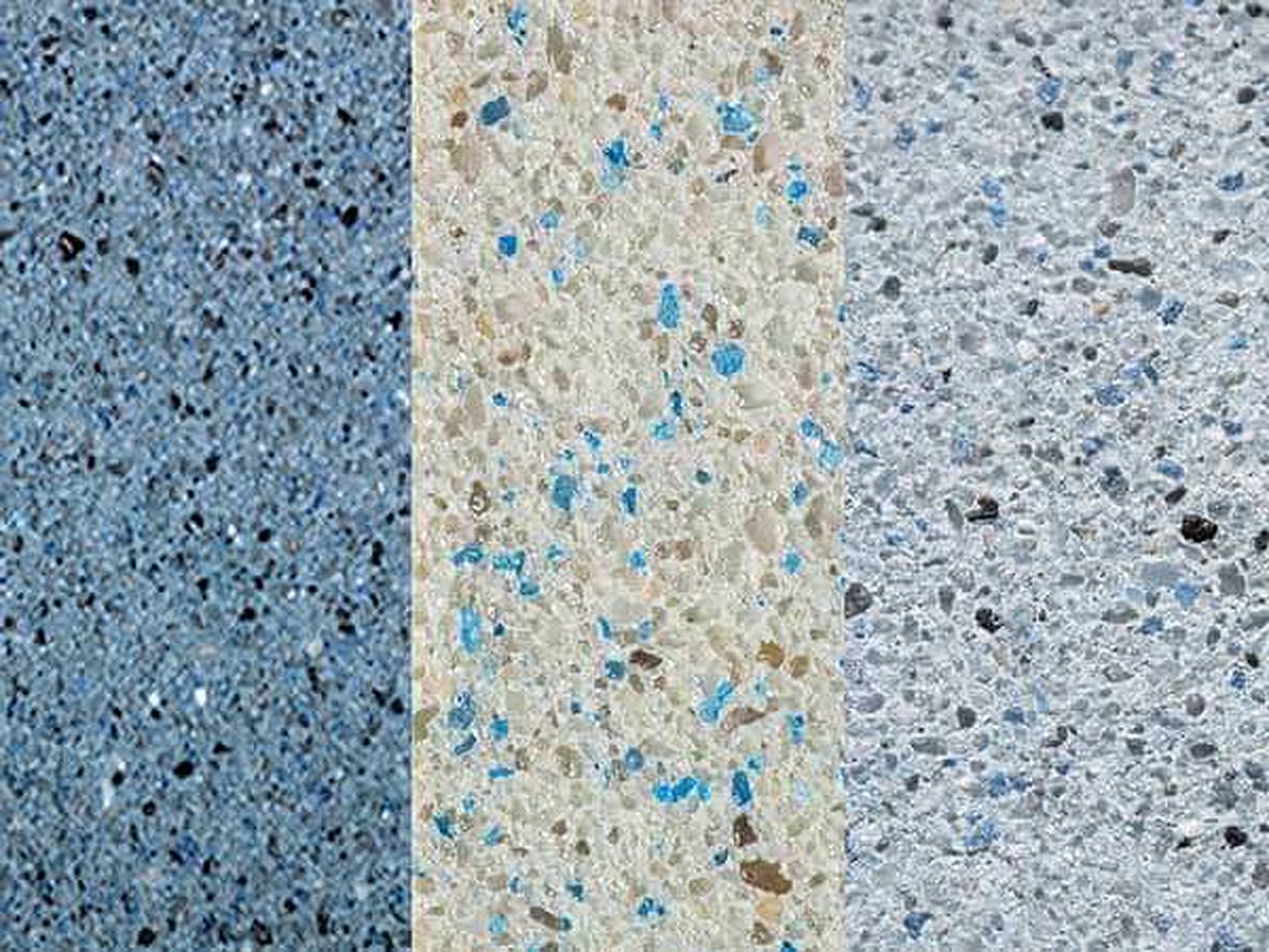 Three gem aggregate pool finish samples, from steel blue to cream and pale gray with blue glass flecks, for a Jupiter homeowner